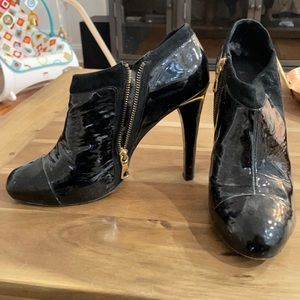 BCBG MaxAzria black patent leather ankle booties